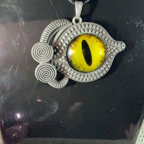 YELLOW EVIL EYE PENDENT ON AN 18” TO 20” BLACK LEATHER NECKLACE - Picture 2 of 3